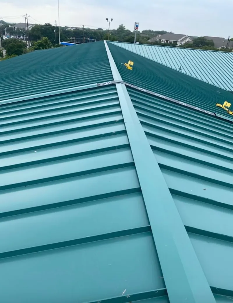 Green commercial metal roof ridge and valley for Metal Roof Repair in East Point