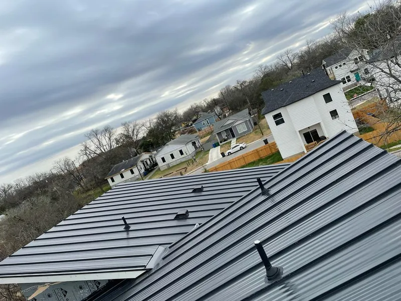 Standing seam metal roof panels with vents for Skylight Repair in East Point